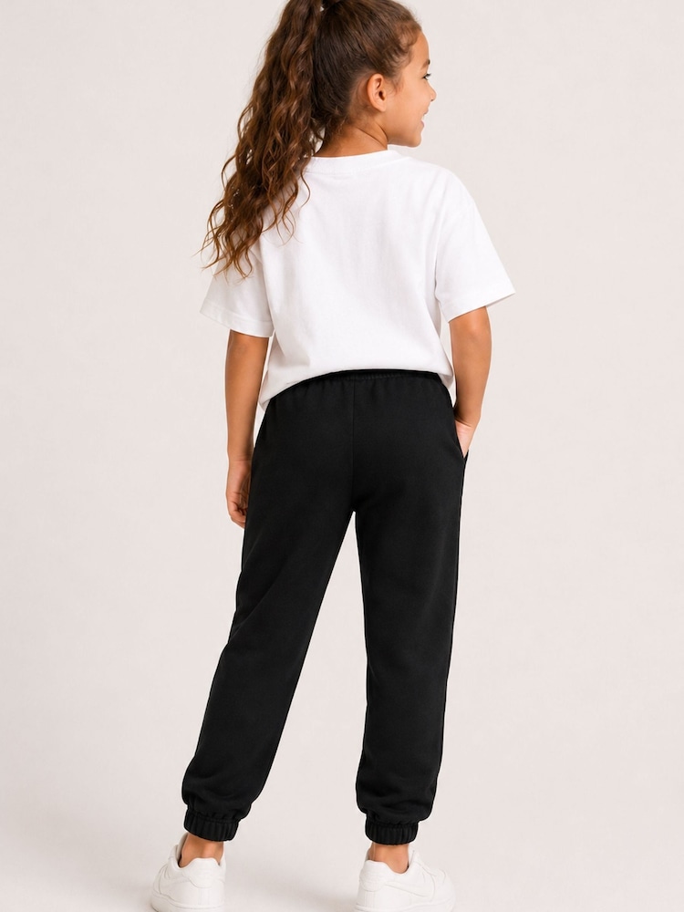 Brand Threads Black Joggers with Iconic Face Print - Image 2 of 4 Brand Threads Black Joggers with Iconic Face Print - Image 2 of 4