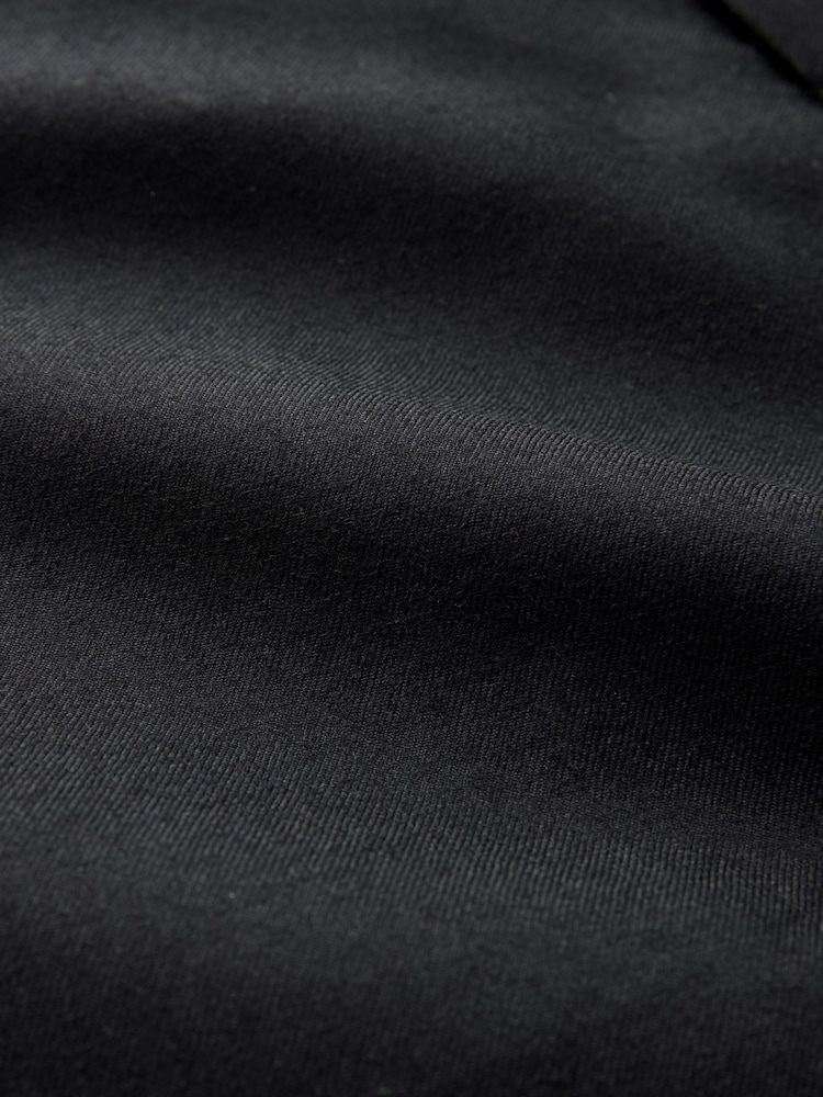 Preto - Ajuste regular - Calças de lã exclusivas 100% com cintura Motion Flex - Imagem 16 de 16