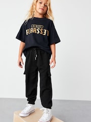 Negro - Pantalones de chándal cargo estilo utilitario (3-16 años) - Imagen 2 de 5
