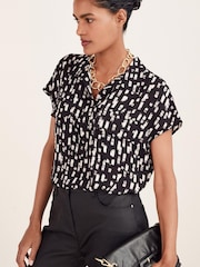 Schwarz/Weiß/Strichmuster - Utility-Oberteil mit Flügelärmeln - Bild 1 von 4