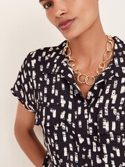 Schwarz/Weiß/Strichmuster - Utility-Oberteil mit Flügelärmeln - Bild 4 von 4