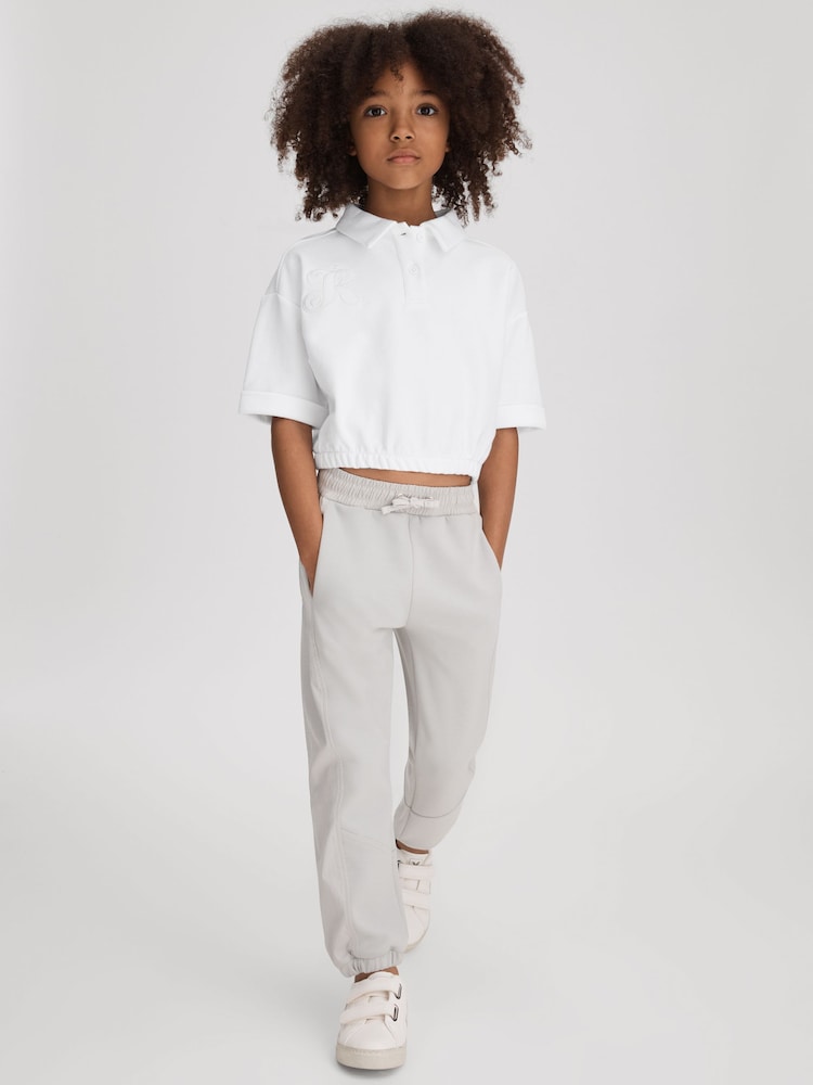 Reiss Ivory Pax 4-9 yrs Cotton Cropped Polo Shirt - Image 1 of 4