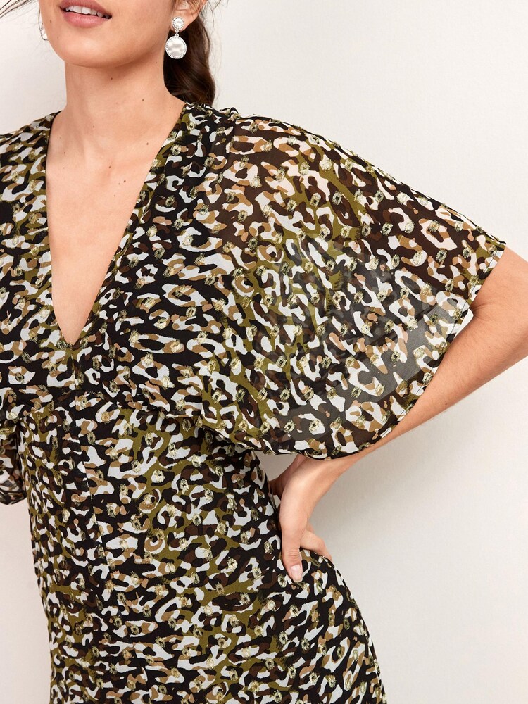 Animal Drucken - Batwing-Jumpsuit mit weitem Beinschnitt - Bild 4 von 4 Animal Drucken - Batwing-Jumpsuit mit weitem Beinschnitt - Bild 4 von 4