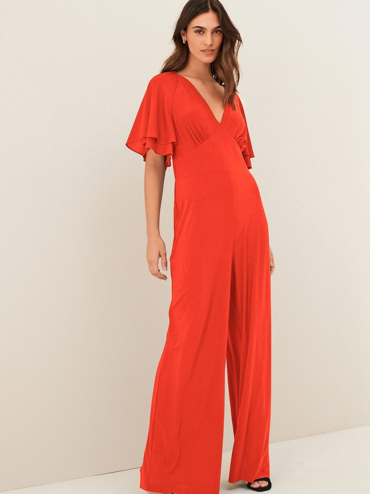 Red Flute Sleeve V-Neck Jumpsuit - Image 1 of 5 Red Flute Sleeve V-Neck Jumpsuit - Image 1 of 5