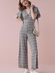 Lilac Purple Ditsy Floral Flute Sleeve V-Neck Jumpsuit - Image 1 of 3