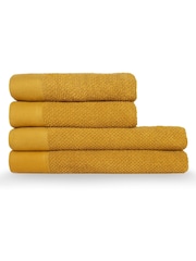 furn. 4 Piece Ochre Yellow Textured 100% Cotton Bale Towels - Image 1 of 4