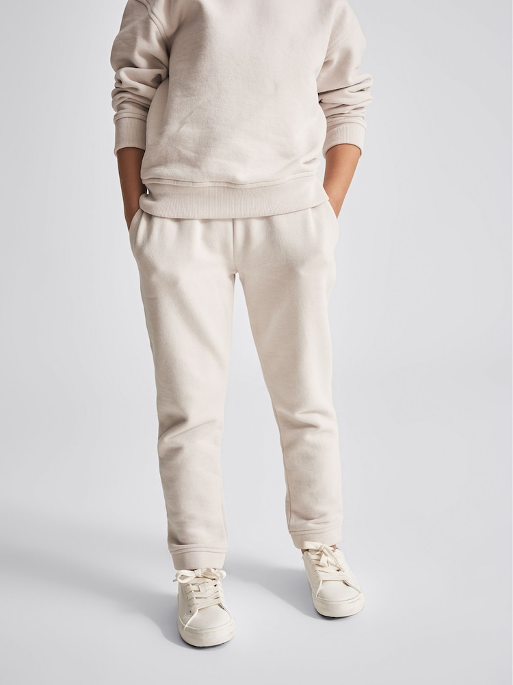 Reiss Cream Oversized Garment Dye Joggers - Image 1 of 6