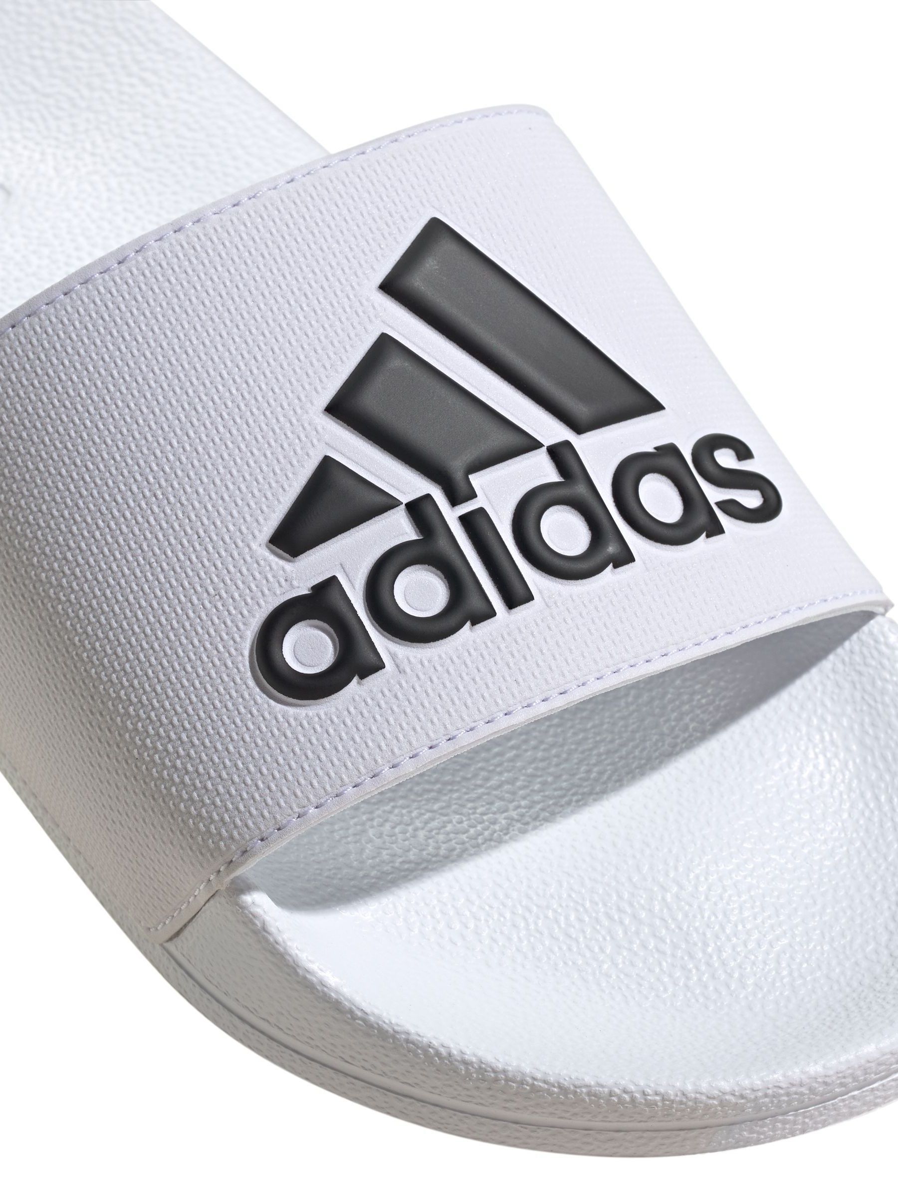 Buy adidas Off White Sportswear Adilette Shower Slides from Next Saudi Arabia