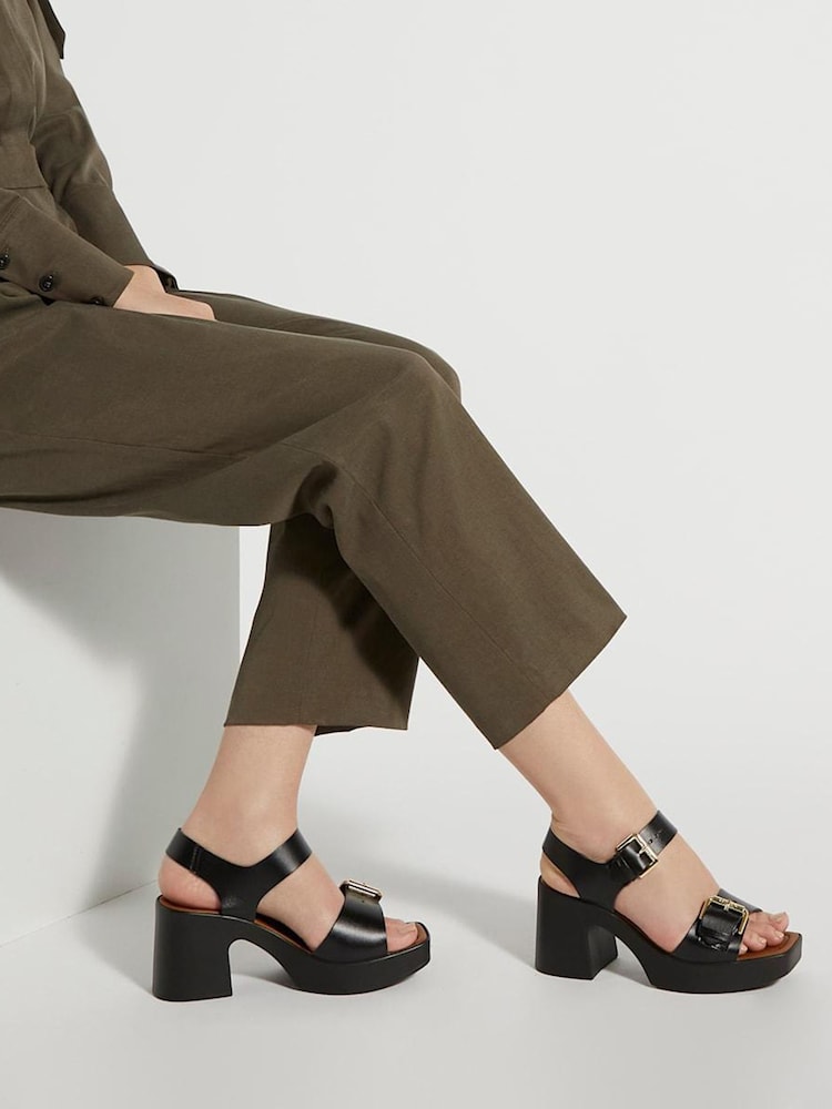 Schwarz - Dune London Jenies Sandalen mit dicker Sohle und Schnalle - Bild 1 von 6 Schwarz - Dune London Jenies Sandalen mit dicker Sohle und Schnalle - Bild 1 von 6