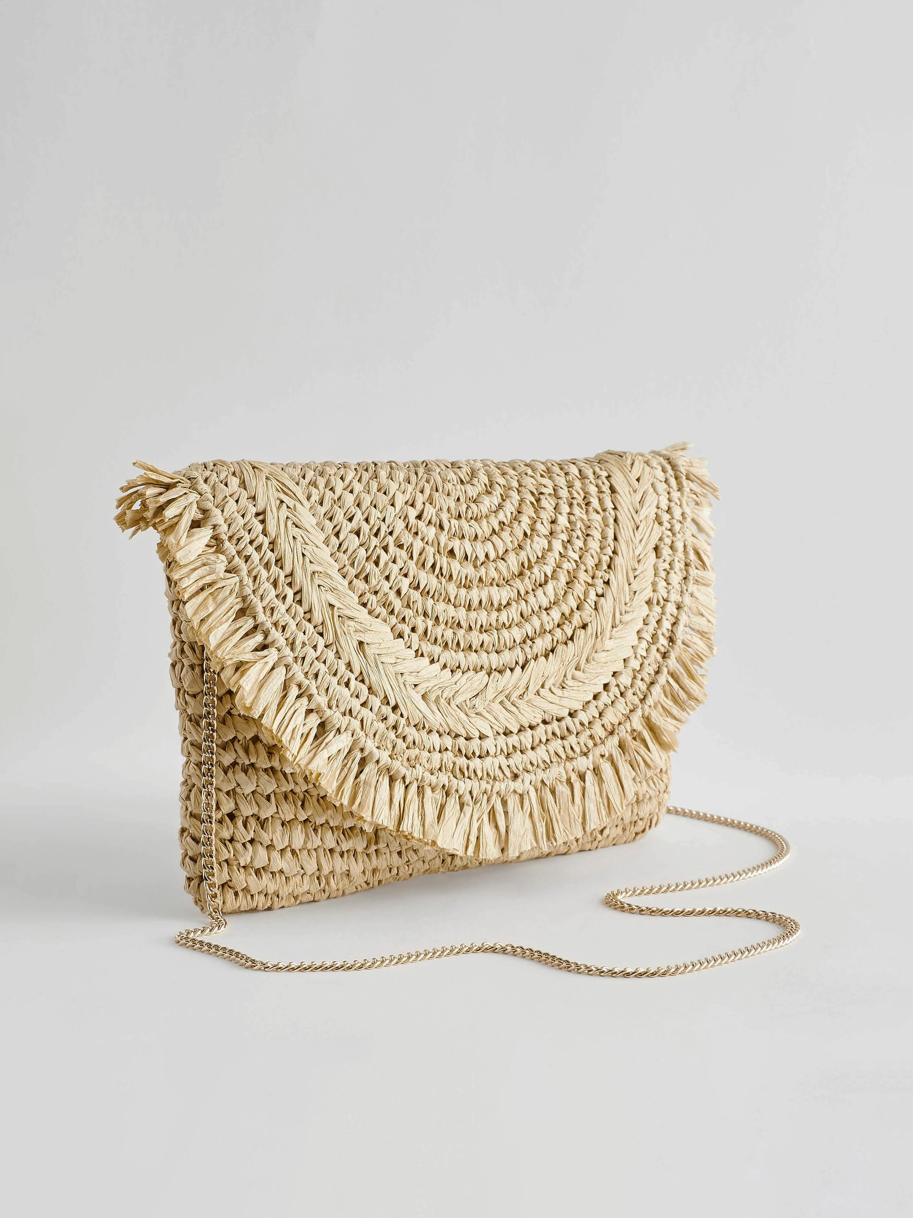 Buy Natural Raffia Fringe Clutch Bag from Next Luxembourg