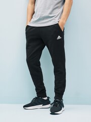 adidas Black Sportswear Essentials French Terry Tapered Cuff 100% Cotton Joggers - Image 1 of 11