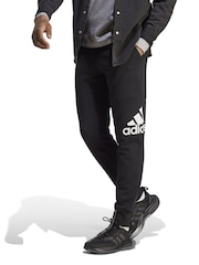 adidas Black Essentials French Terry Tapered Cuff Logo Joggers - Image 1 of 8