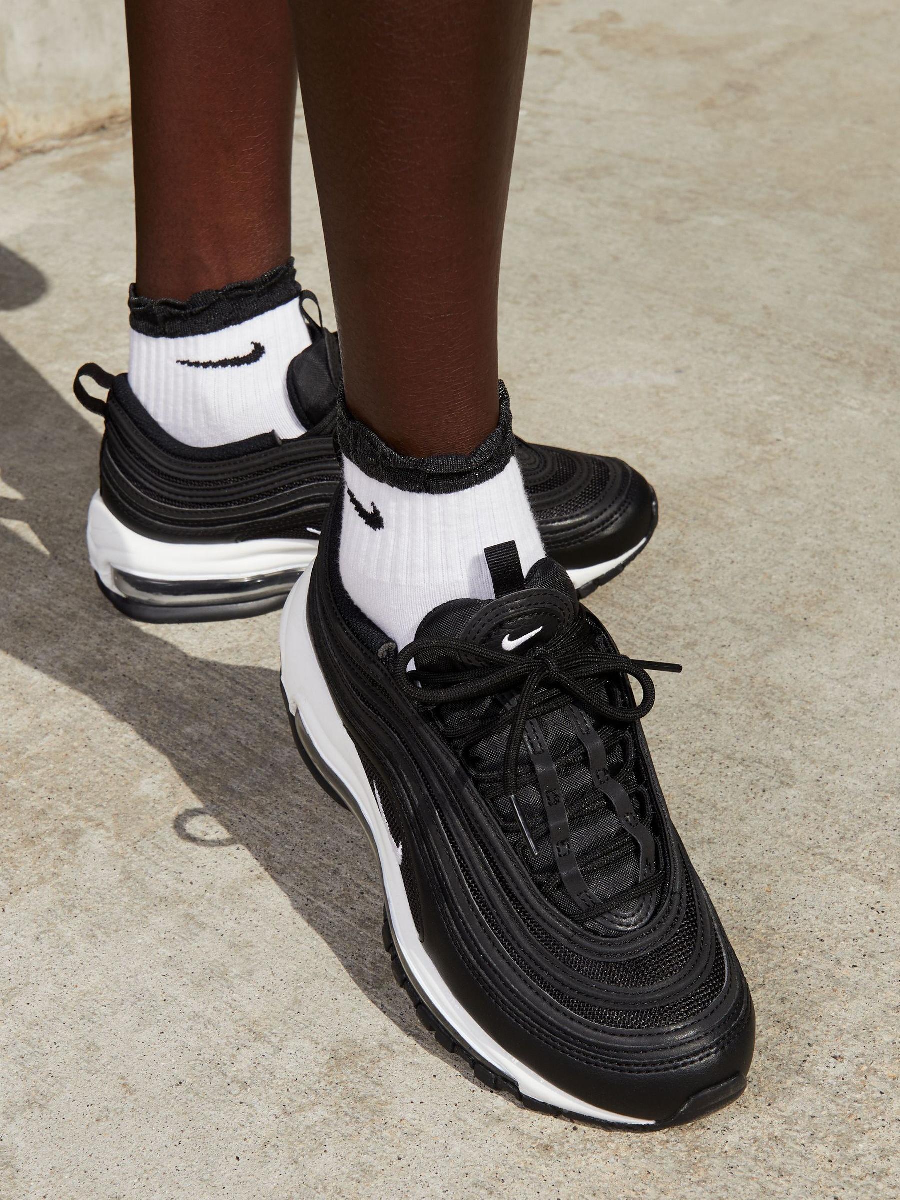 nike black trainers 97