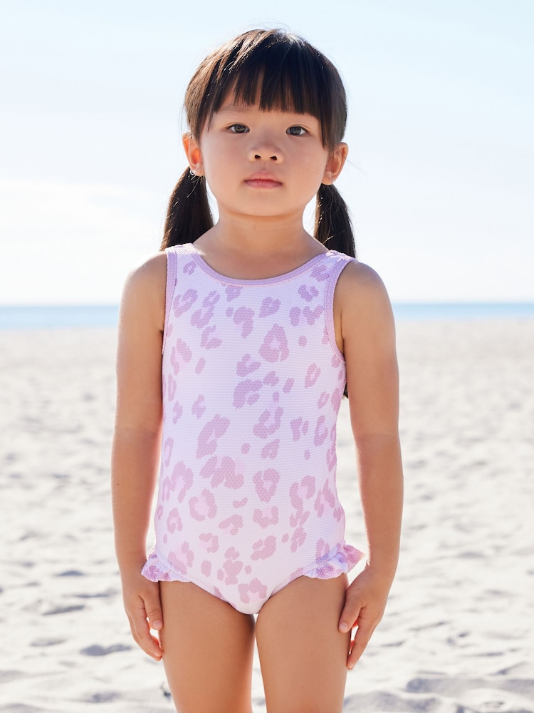 Violett mit Animalprint - Badeanzug mit Rüschen (3 Monate–10 Jahre) - Bild 2 von 7 Violett mit Animalprint - Badeanzug mit Rüschen (3 Monate–10 Jahre) - Bild 2 von 7