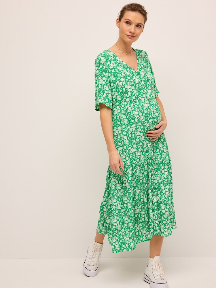 Grün mit floralem Print - Umstandsmode Kleid mit Flügelärmeln - Bild 1 von 8