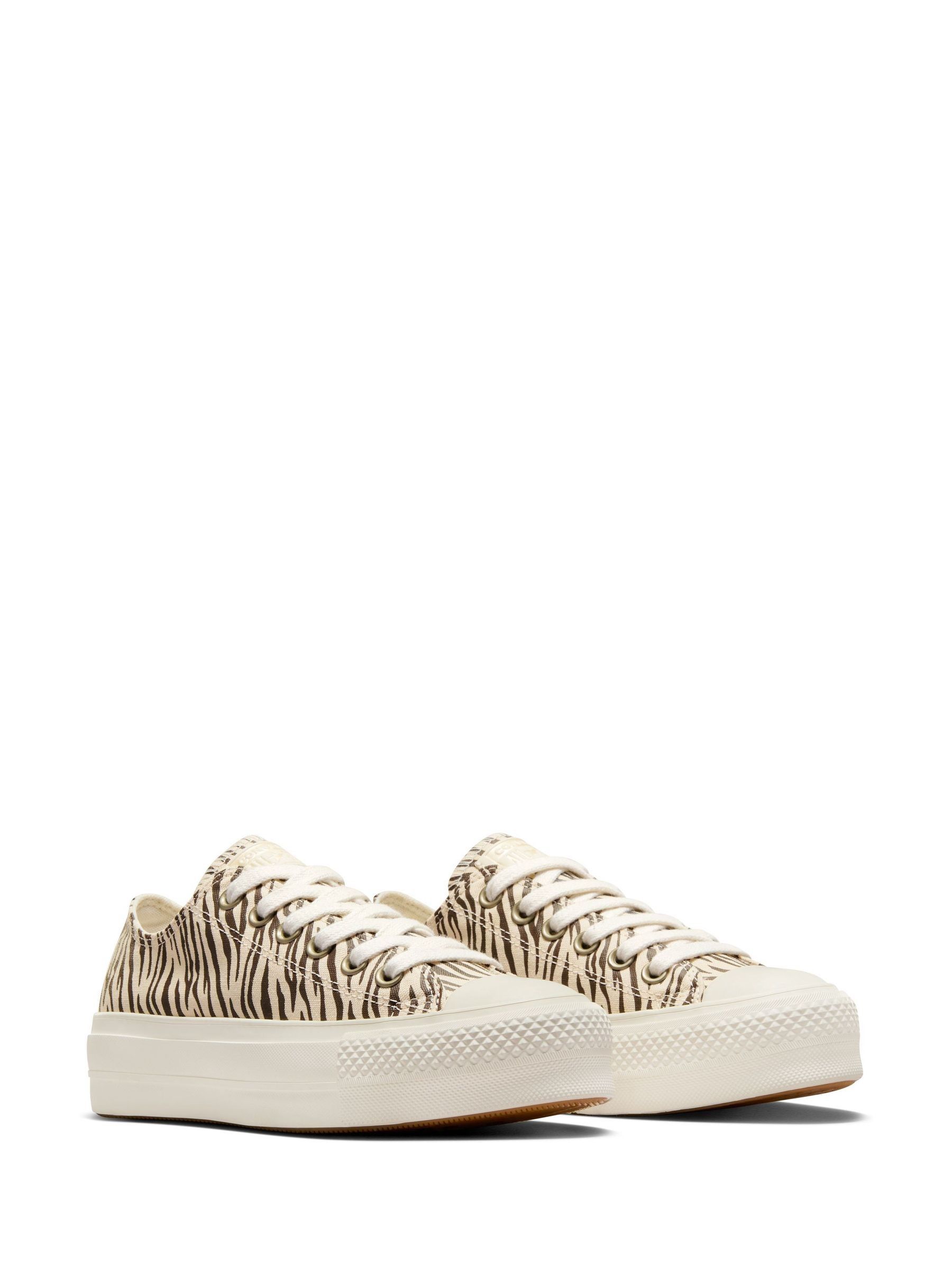 Animal print chuck taylors 2025