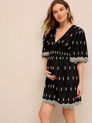 Schwarz - Umstandsmode Kleid mit Lochstickerei - Bild 1 von 8