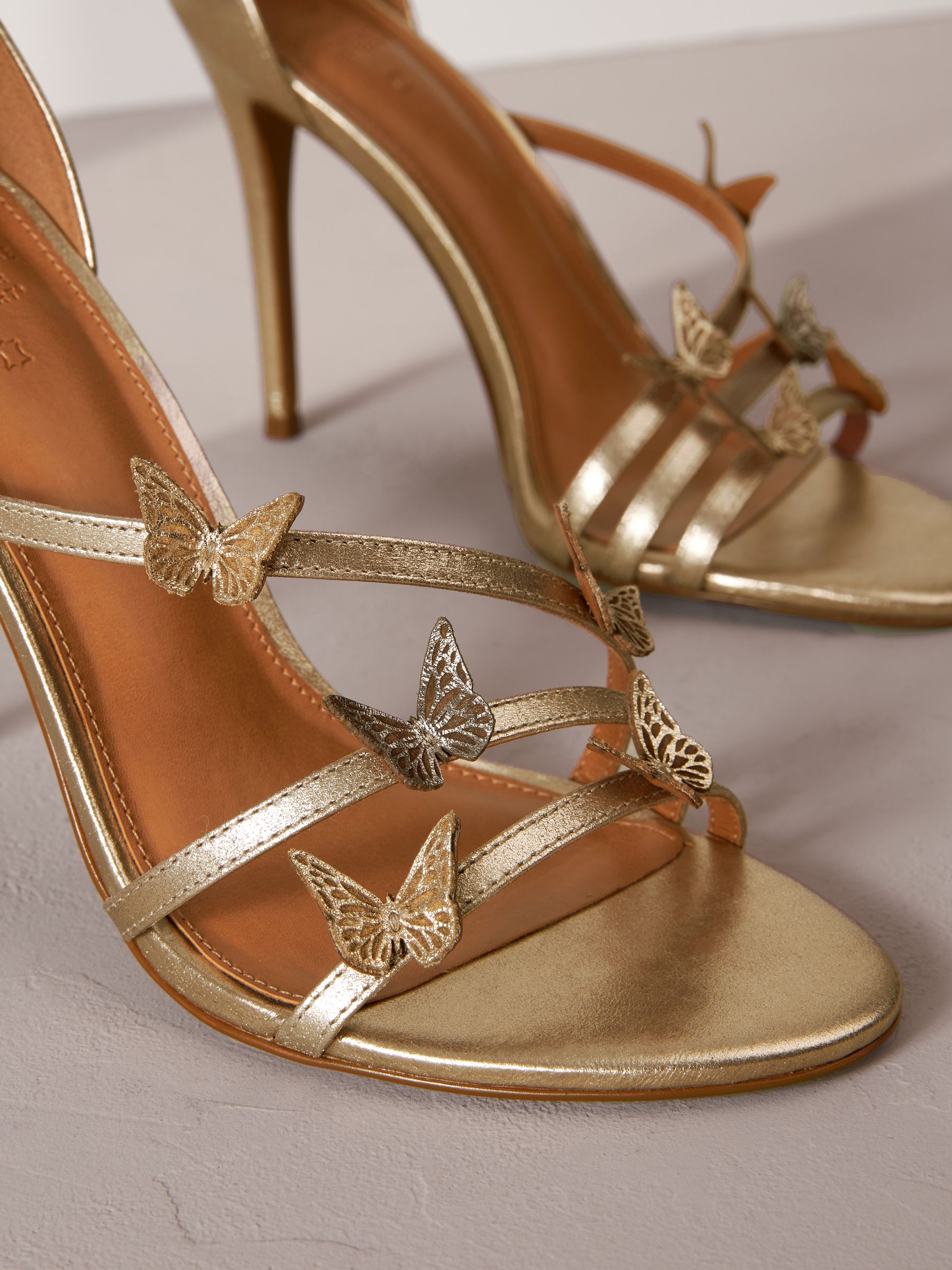 Buy Gold Signature Leather Butterfly High Heel Sandals from Next Luxembourg