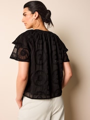 Black Tie Neck Double Sleeve Sunflower Blouse - Image 1 of 3