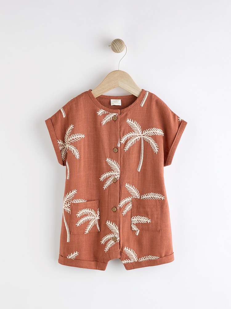 Rust Palm Tree Woven Baby Romper (0mths-2yrs) - Image 1 of 12 Rust Palm Tree Woven Baby Romper (0mths-2yrs) - Image 1 of 12