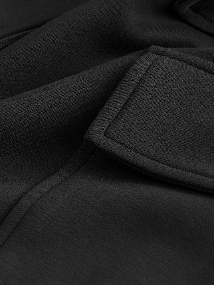 Schwarz - Geschmeidige Utility-Cargohose mit Stretchanteil, weitem Bein, Gürtel und hohem Bund - Bild 1 von 7 Schwarz - Geschmeidige Utility-Cargohose mit Stretchanteil, weitem Bein, Gürtel und hohem Bund - Bild 1 von 7