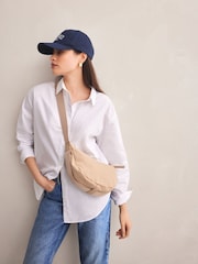 Bone Sling Cross-Body Bag - Image 1 of 10