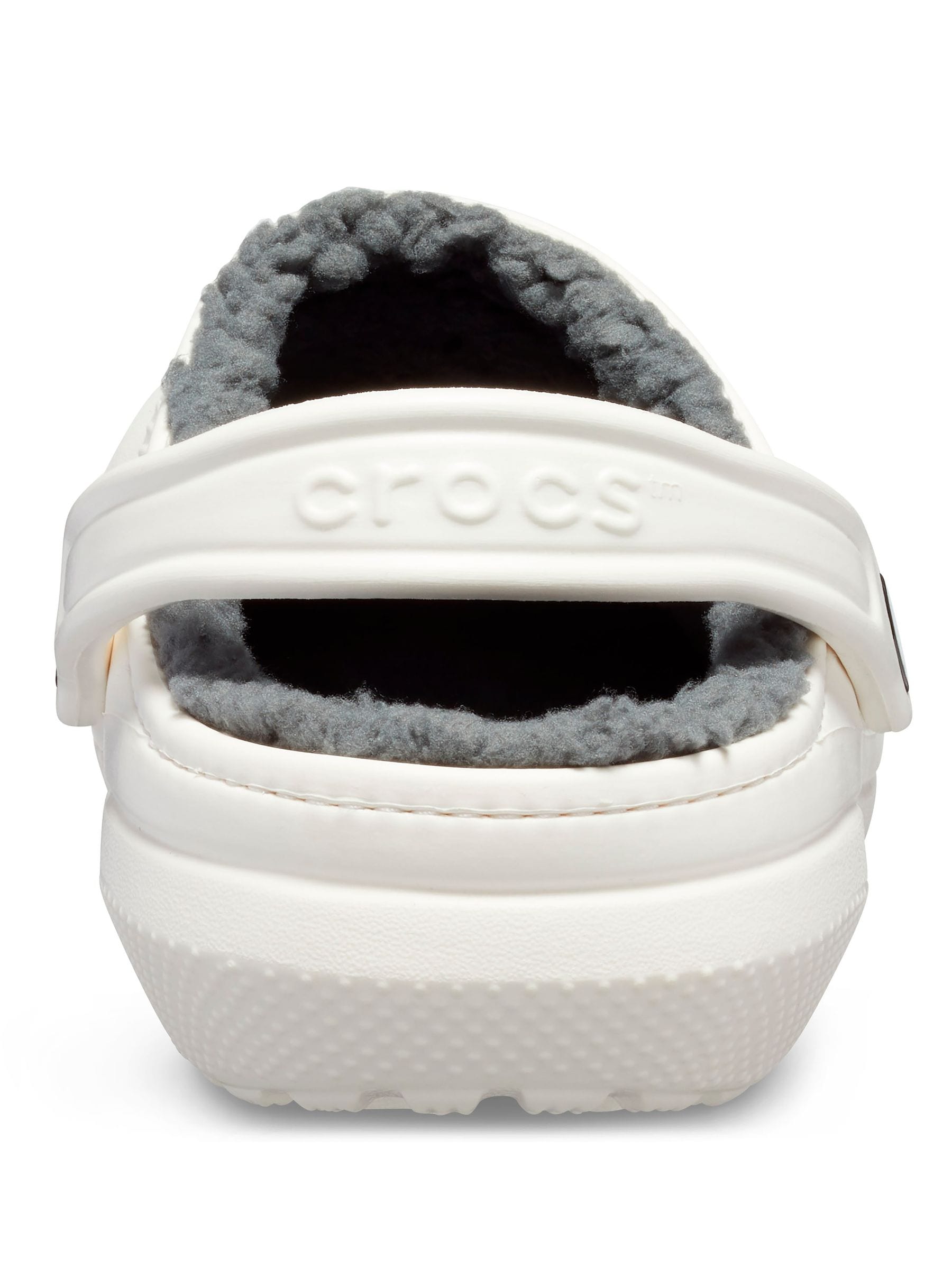 Fuzzy white crocs store