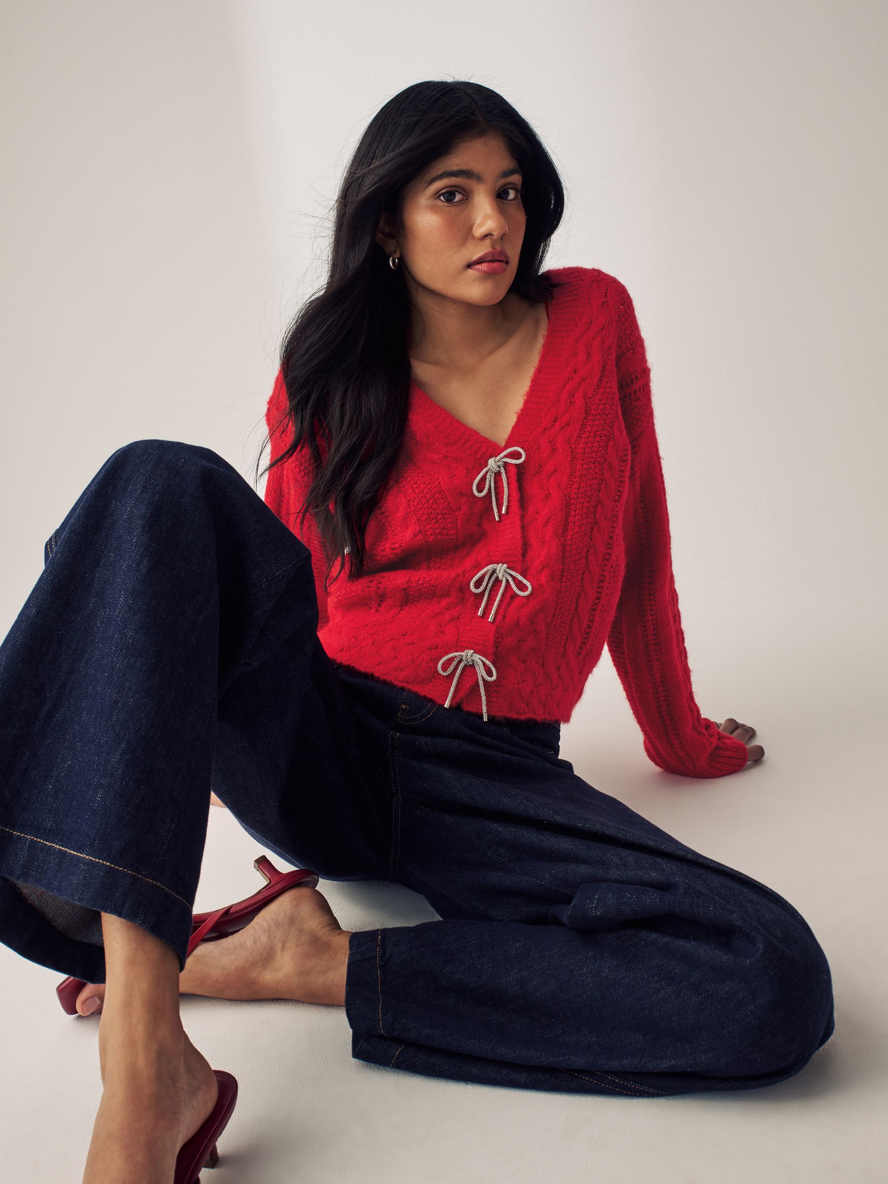 Buy Red Sparkle Bow Button Cable Knitted Cardigan from Next USA
