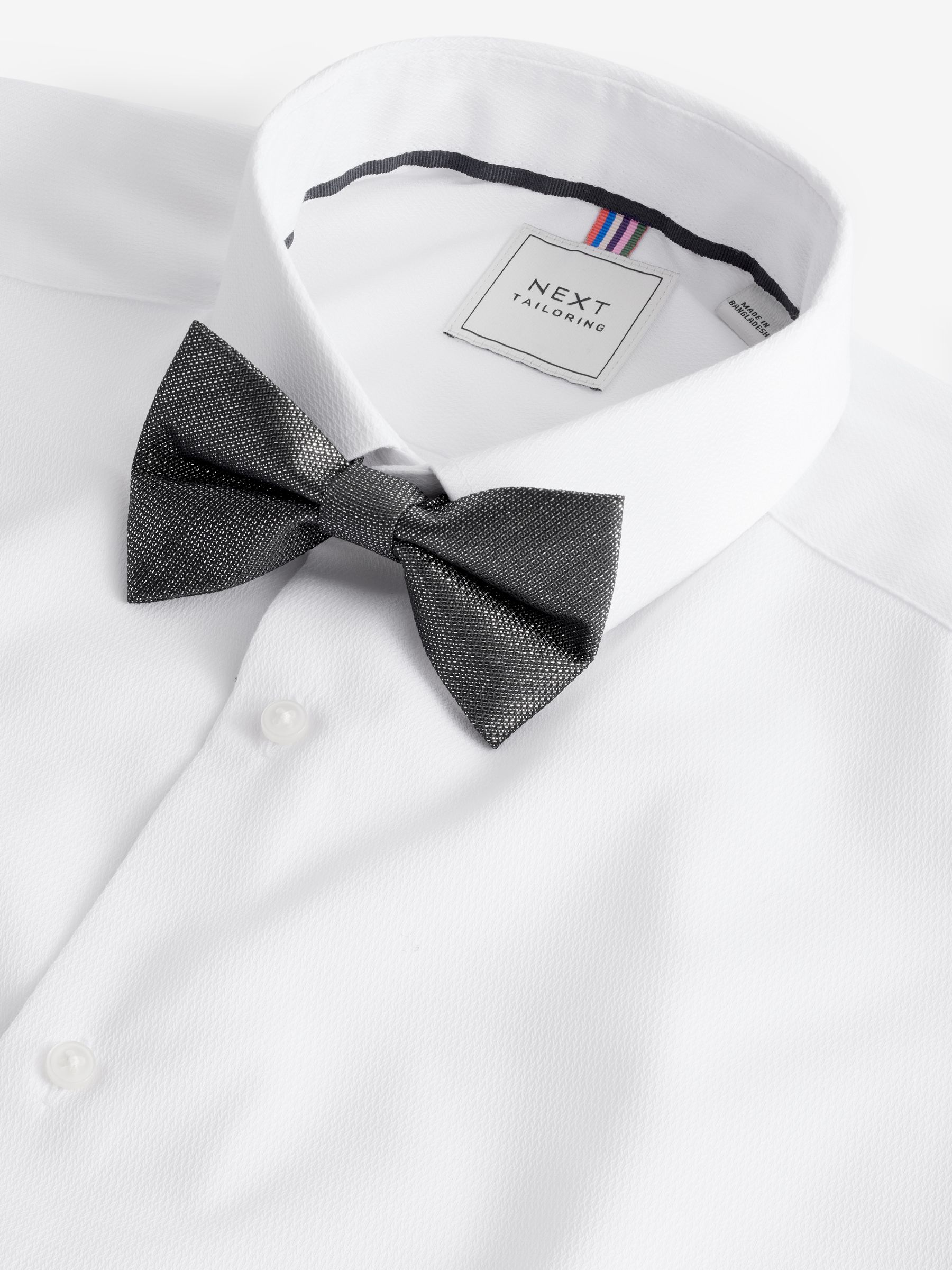 White shirt silver tie 2025