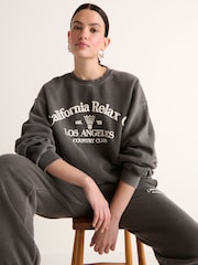 Charcoal Grey Relaxed Fit Oversized Washed California Long Sleeve Graphic Slogan Sweatshirt - Image 1 of 6
