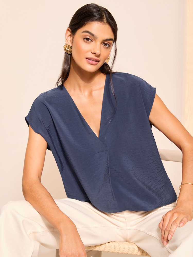 Friends Like These Navy Blue Short Sleeve V Neck Woven Blouse - Image 1 of 4 Friends Like These Navy Blue Short Sleeve V Neck Woven Blouse - Image 1 of 4