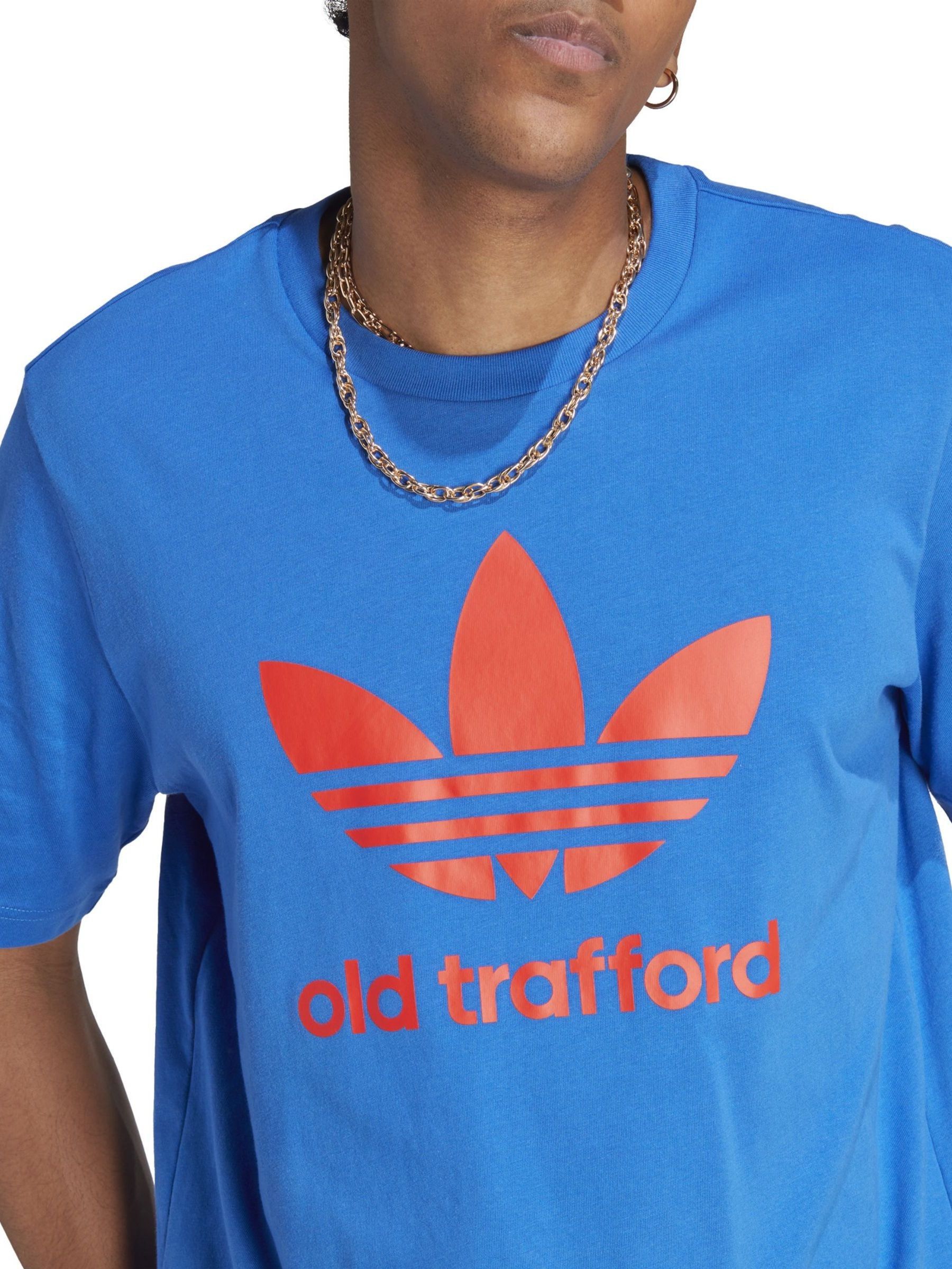 Blue and orange adidas shirt store