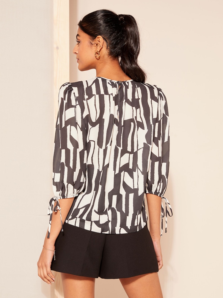 Friends Like These Black/White 3/4 Sleeve Chiffon Tie Cuff Blouse - Image 4 of 4
