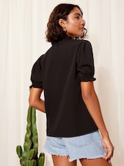 Friends Like These Black Short Sleeve Woven Tie Neck Blouse - Image 4 of 4