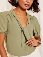 Friends Like These Green Short Sleeve Bow Front Crepe Blouse - Image 1 of 4