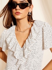Friends Like These Black/White Polka Dot Ruffle Front Puff Sleeve Blouse - Image 1 of 4