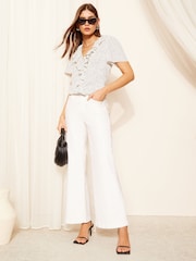 Friends Like These Black/White Polka Dot Ruffle Front Puff Sleeve Blouse - Image 3 of 4