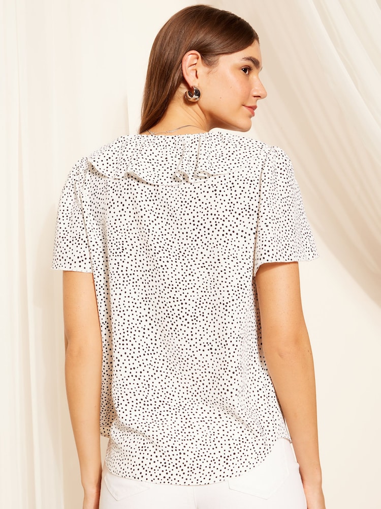 Friends Like These Black/White Polka Dot Ruffle Front Puff Sleeve Blouse - Image 4 of 4