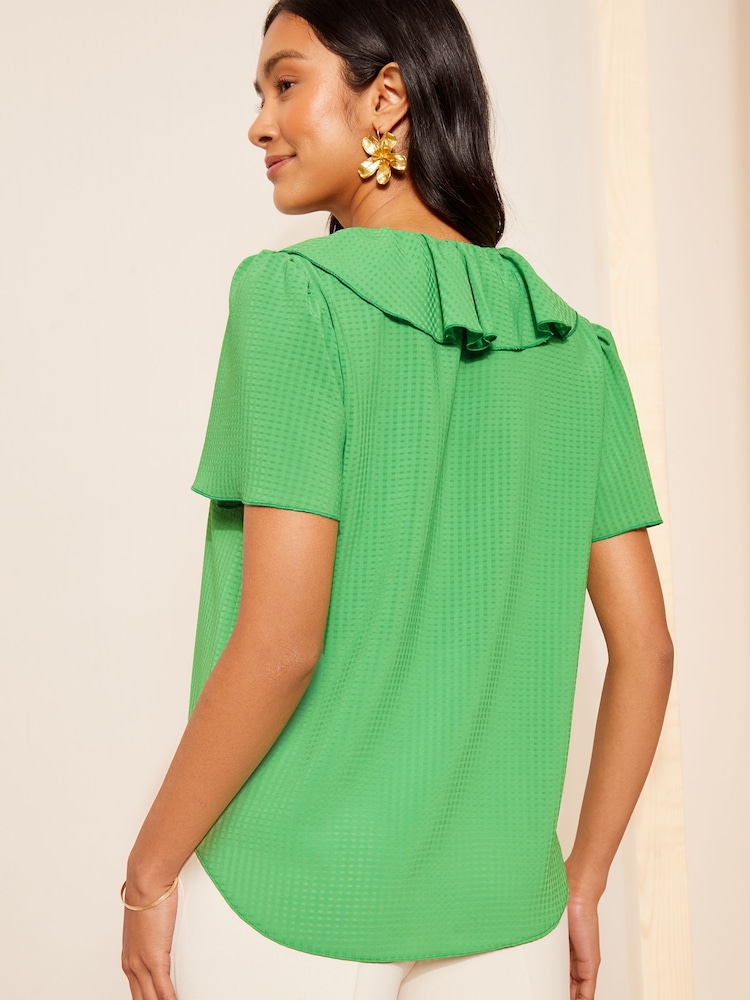 Friends Like These Seersucker Lime Ruffle Front Puff Sleeve Blouse - Image 4 of 4 Friends Like These Seersucker Lime Ruffle Front Puff Sleeve Blouse - Image 4 of 4