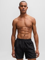 Negro - BOSS Swim Shorts With Logo And Stripe - Imagen 1 de 4