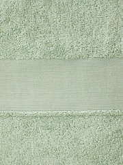 Catherine Lansfield Set of 2 Sage Green Anti-Bacterial 100% Cotton Towels - Image 4 of 4