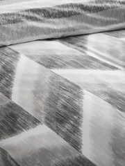Catherine Lansfield Charcoal Grey Kamari Stripe Reversible Duvet Cover Set - Image 4 of 4