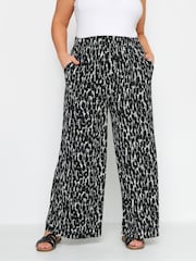 Yours Curve Black Leopard Print Jersey Wide Leg Trousers - Image 1 of 4