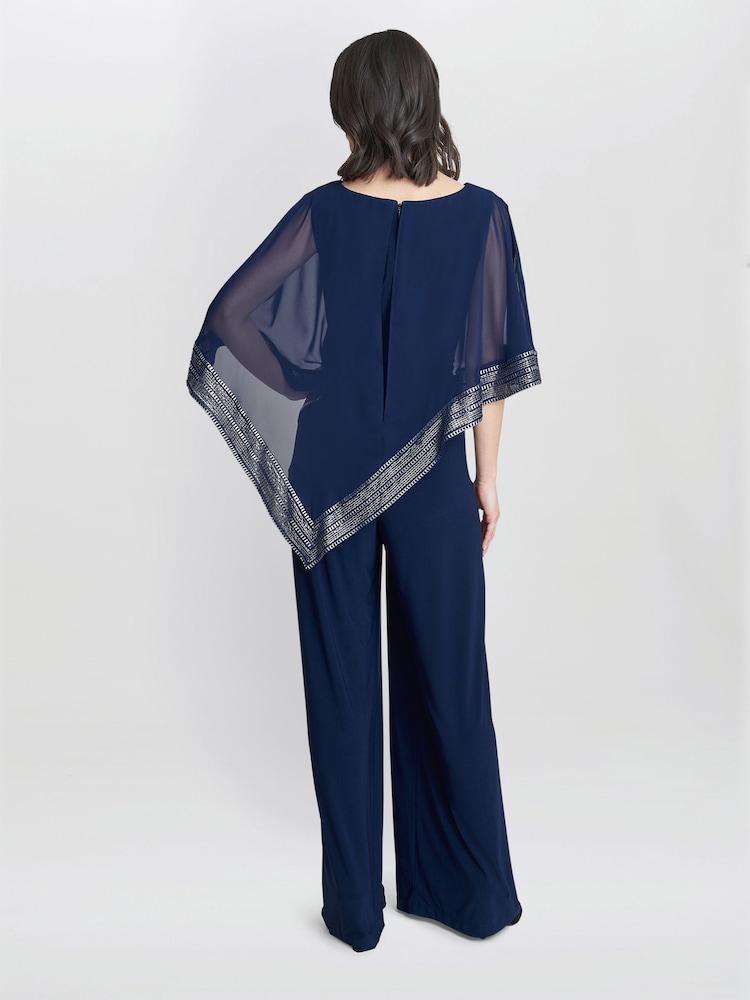 Gina Bacconi Eve Asymmetrical Cape Jumpsuit With Foil Trim - Imagen 2 de 5
