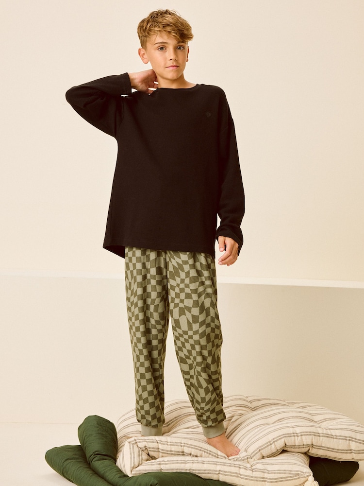 Black/Green Checkerboard - Kuscheliger Fleece-Pyjama (3–16 Jahre) - Bild 1 von 8 Black/Green Checkerboard - Kuscheliger Fleece-Pyjama (3–16 Jahre) - Bild 1 von 8