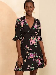 Love & Roses Black Floral Printed Twist Flute Sleeve Mini Dress - Image 1 of 4