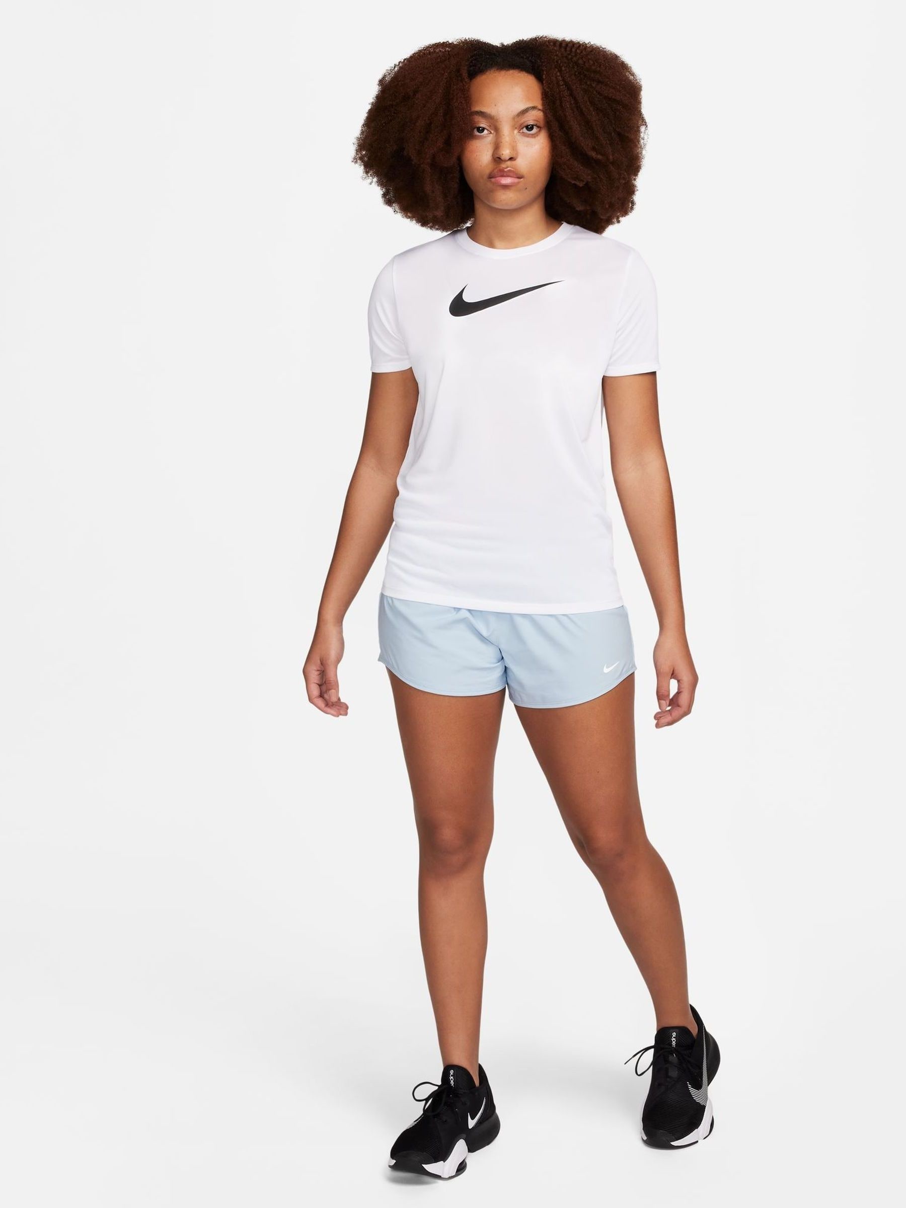 white nike shirt with blue swoosh