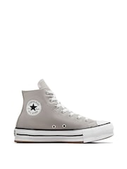 حذاء رياضي Chuck Taylor رافع للجسد من إيثيلين فينيل أسيتات للشباب من Converse - صورة 1 من 8
