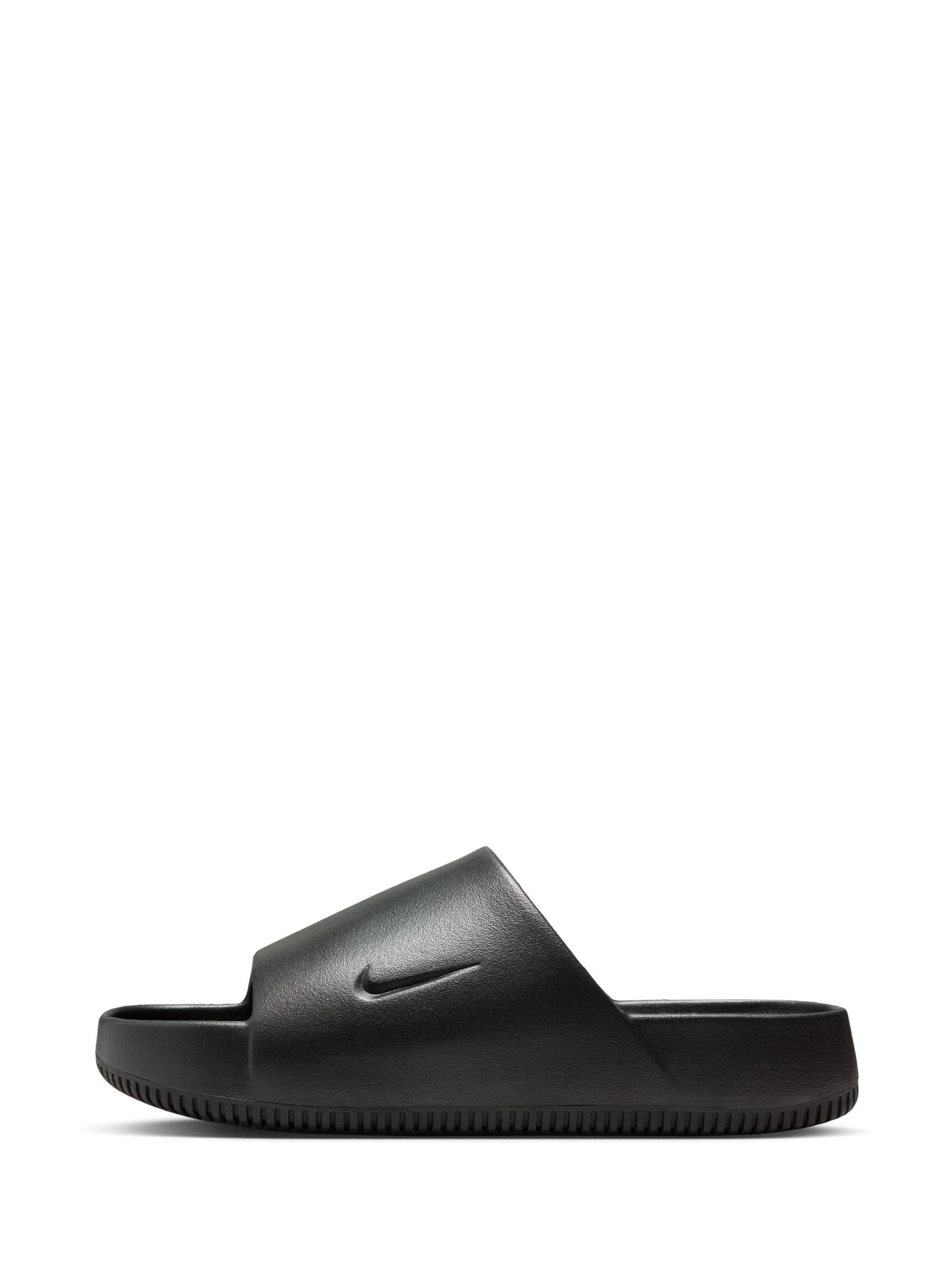 Przeglądaj Czarny - Nike Calm Slides Slippers from Next Poland