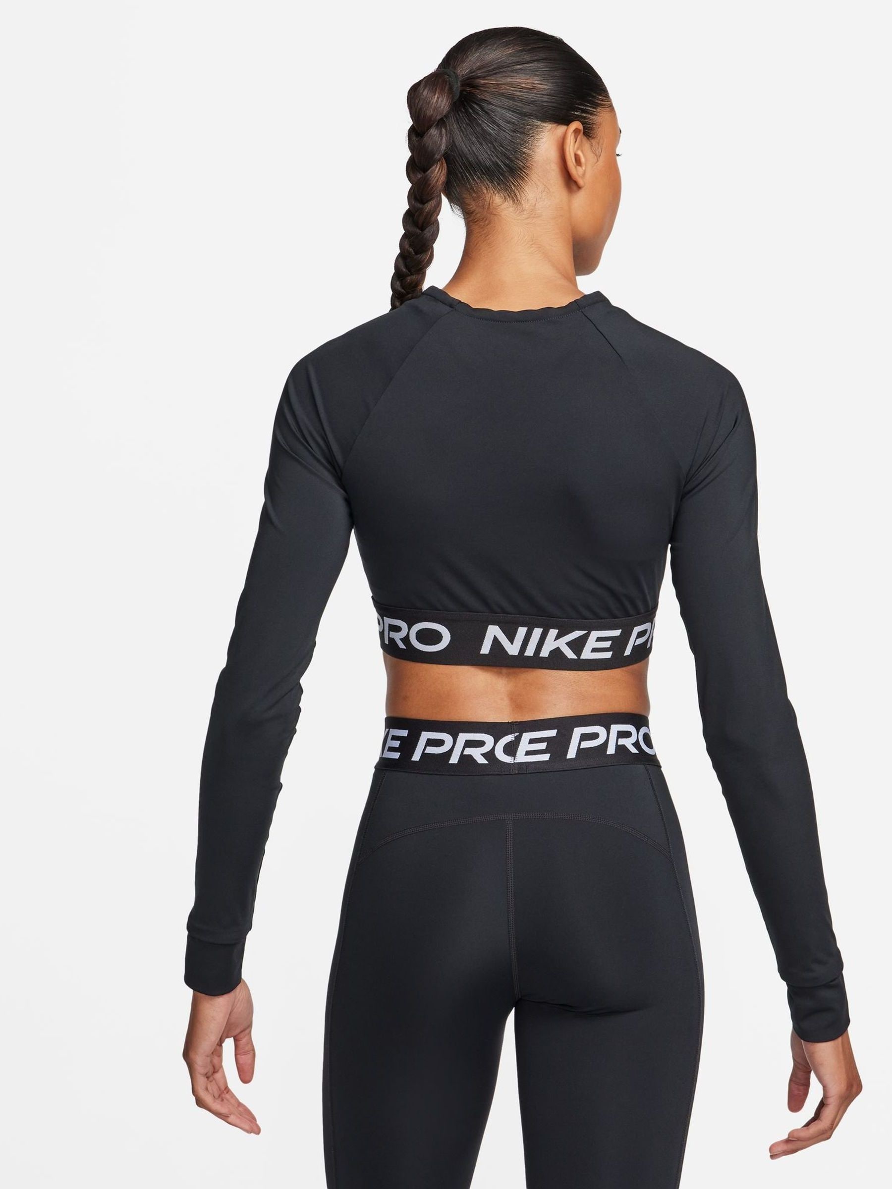 Nike training long sleeve mesh crop top in black shop